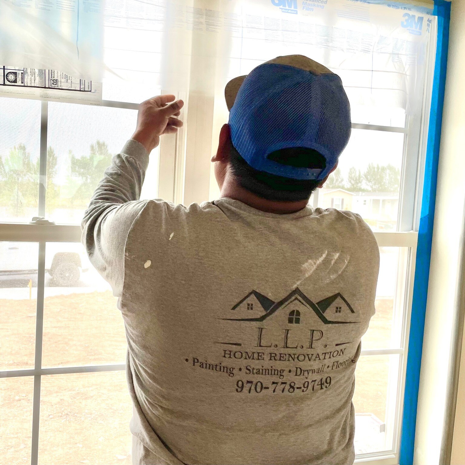 Owner of LLP Home Renovation adding the final touches to a project, ensuring quality craftsmanship and attention to detail